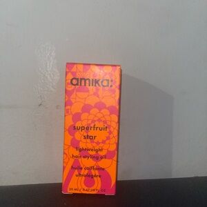 Amika Superfruit Star Hair Oil in Vibrant Orange and Pink